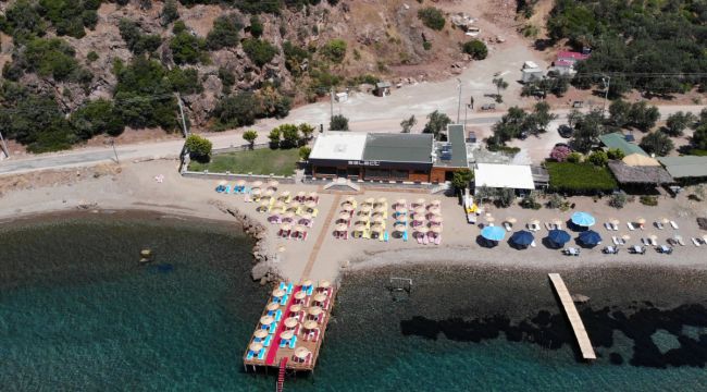 Assos'ta kaçak restoran ve plaj kısmına yıkım kararı