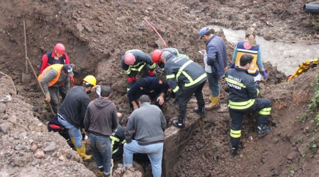 Toprak altında kalan işçi 1 saatlik çalışmanın ardından kurtarıldı