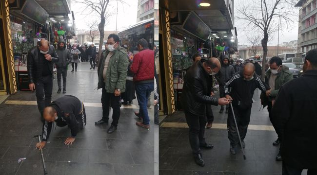 Sürünme numarasıyla dilenen şahıs zabıtadan kaçamadı