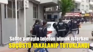 Sahte parayla telefon almak isterken suçüstü yakalanıp tutuklandılar