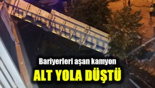 Bariyerleri aşan kamyon alt yola düştü