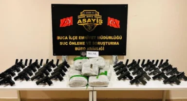 İzmir'de silah kaçakçılarının evinde 13 kilo uyuşturucu ele geçirildi