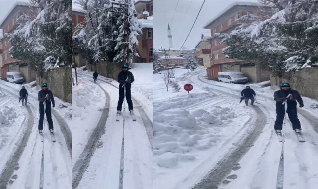 Pikabın arkasına bağladığı iple mahalle arasında kayak yaptı